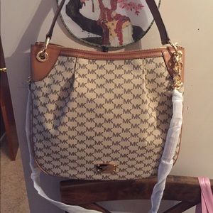 Michael kors acorn and luggage color handbag